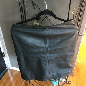 All saints dark green leather skirt.